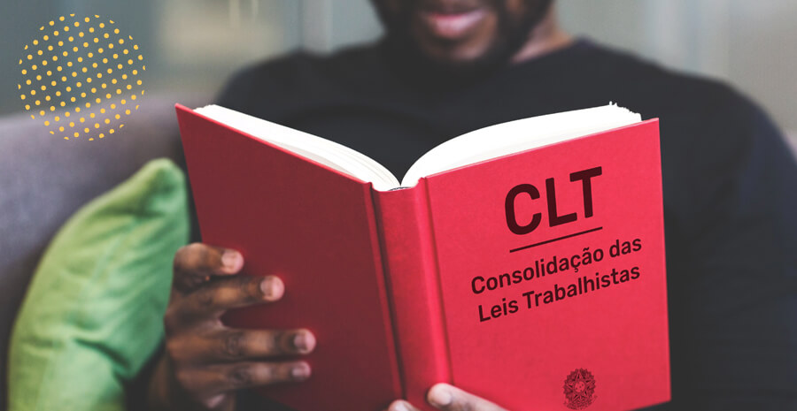 imagem de uma pessoa segurando um livro vermelho escrito CLT na capa